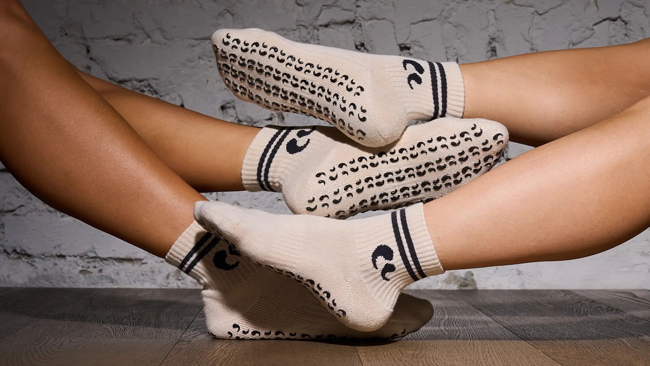 custom grip socks with logo details and grip soles — merch that isn't a t-shirt